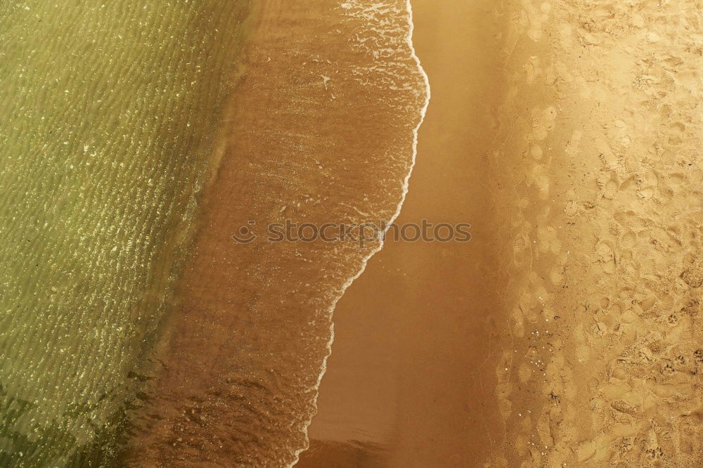 Similar – Beautiful aerial view of a beach with waves