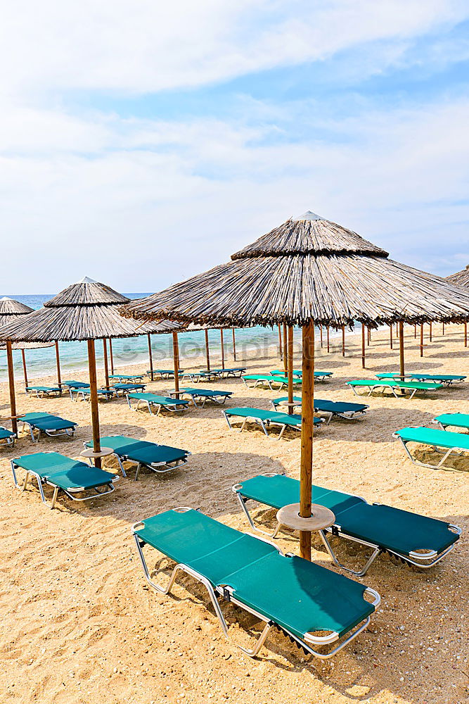 Similar – Image, Stock Photo Empty loungers on the beach