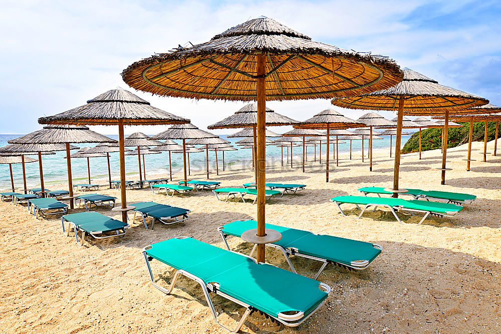 Similar – Image, Stock Photo Empty loungers on the beach