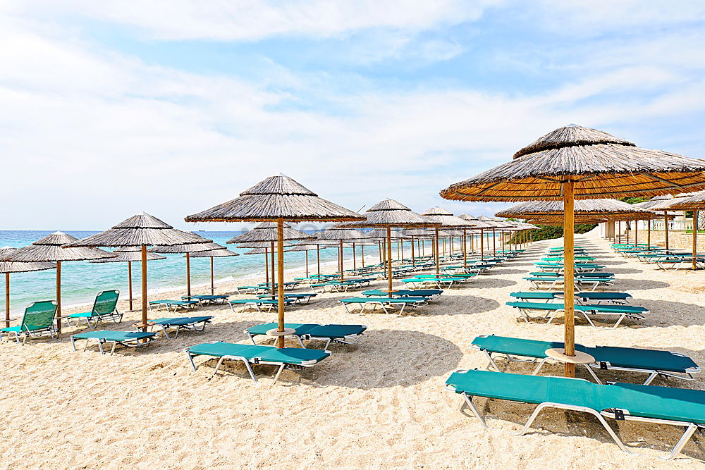 Similar – Image, Stock Photo Empty loungers on the beach