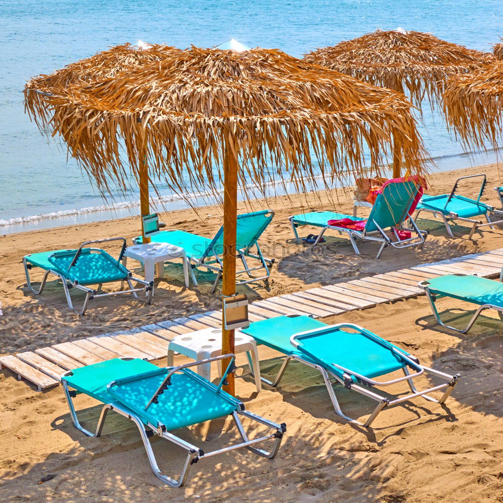 Similar – Image, Stock Photo Empty loungers on the beach