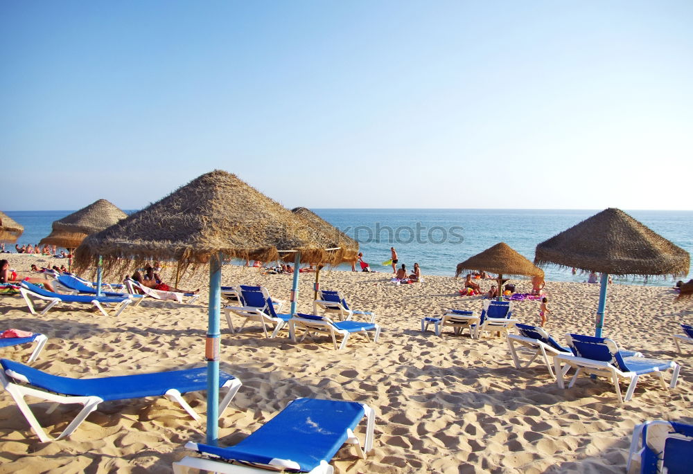 Similar – Image, Stock Photo Empty loungers on the beach