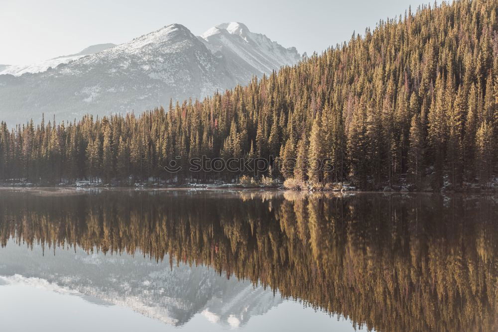 Similar – Wooden dock on lake in mountains