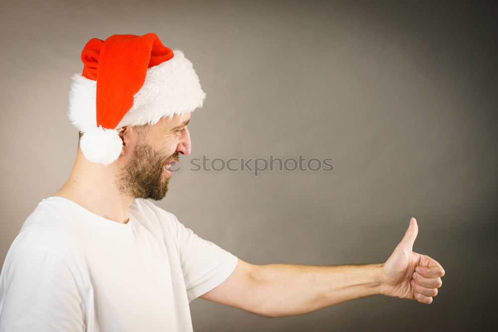 Fingers dressed as Santa Claus