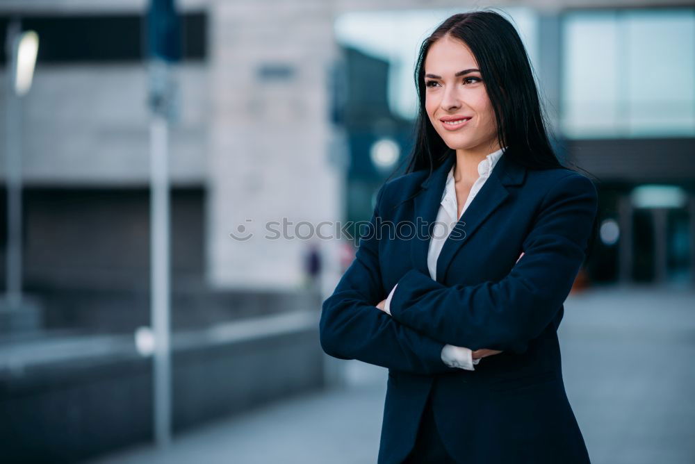 Similar – Image, Stock Photo Young businesswoman standing outside of office building