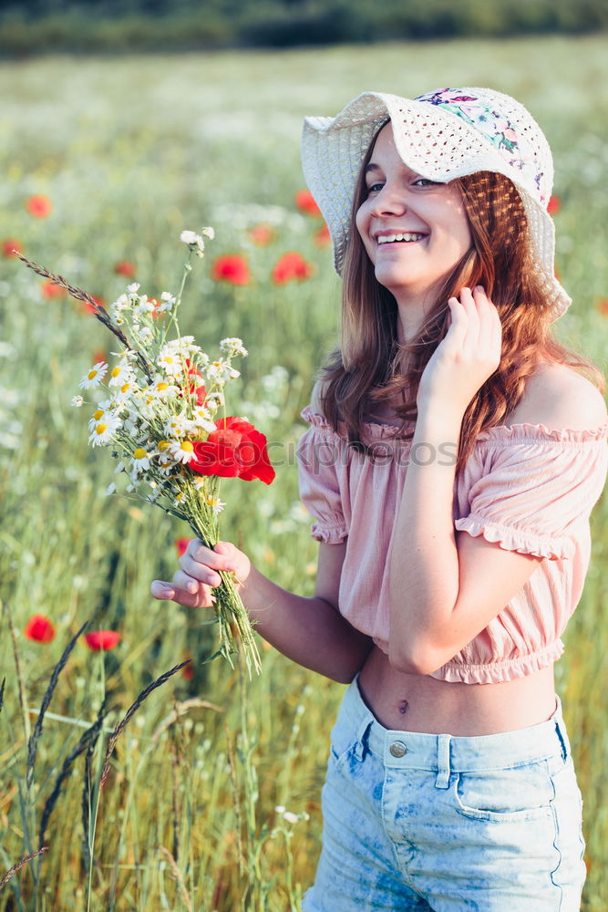 Similar – Beautieful young girl in the field of wild flowers