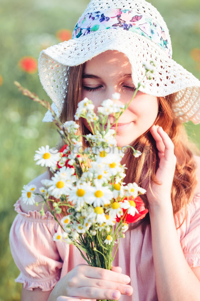 Similar – Beautieful young girl in the field of wild flowers