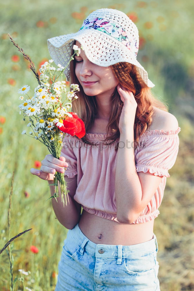 Similar – Beautieful young girl in the field of wild flowers