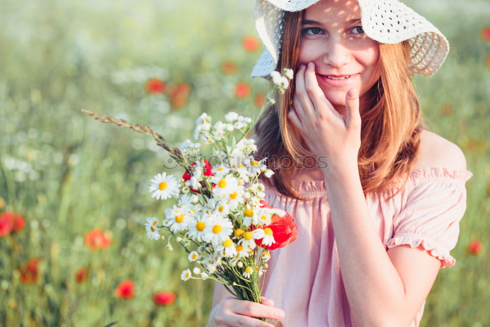 Similar – Beautieful young girl in the field of wild flowers