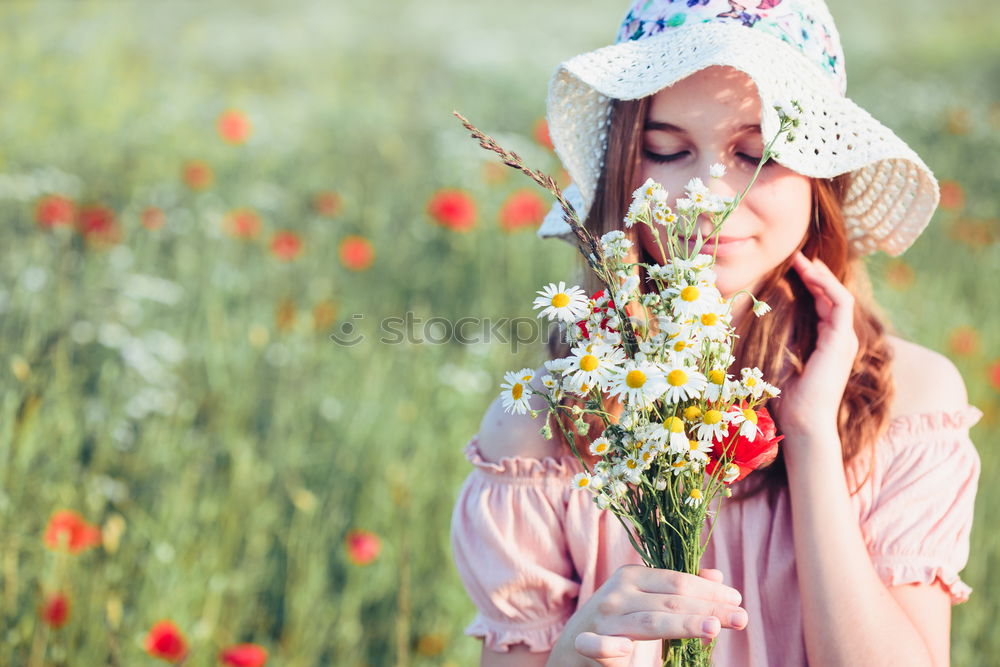 Similar – Beautieful young girl in the field of wild flowers