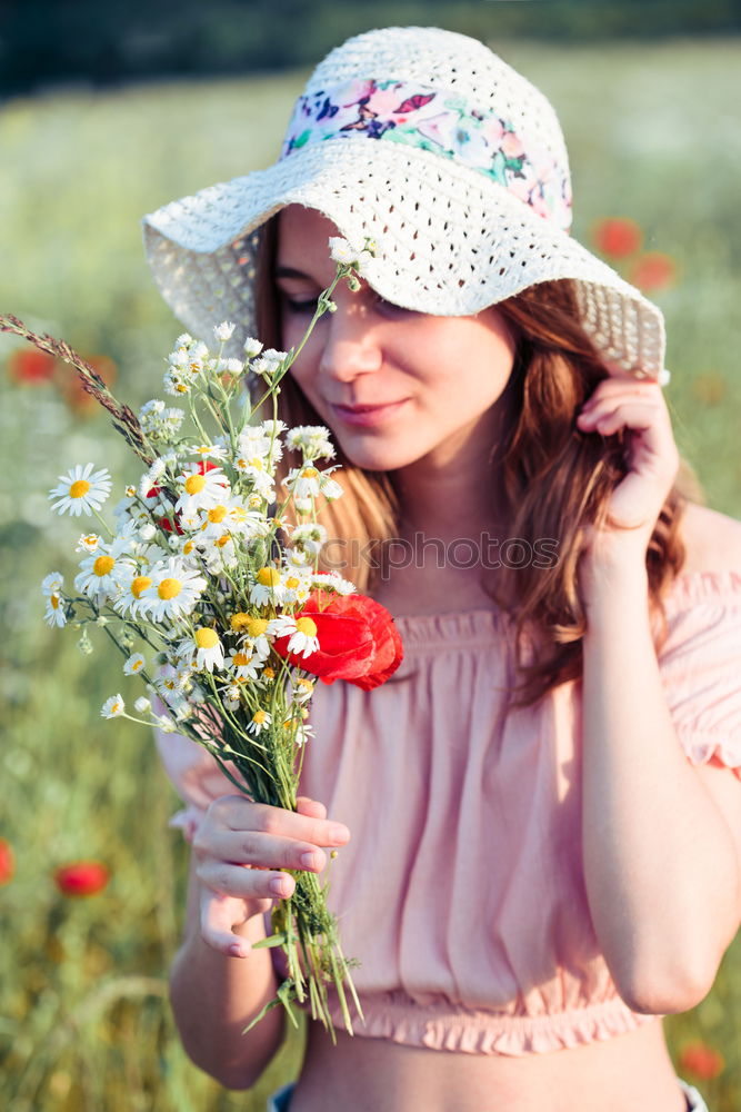 Similar – Beautieful young girl in the field of wild flowers