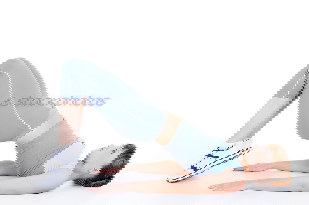 Similar – Image, Stock Photo Young sporty woman doing exercises with a latex band