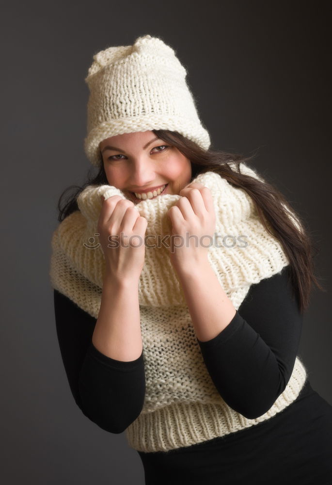 Similar – Image, Stock Photo Smiling young girl in winter cap, scarf and mittens
