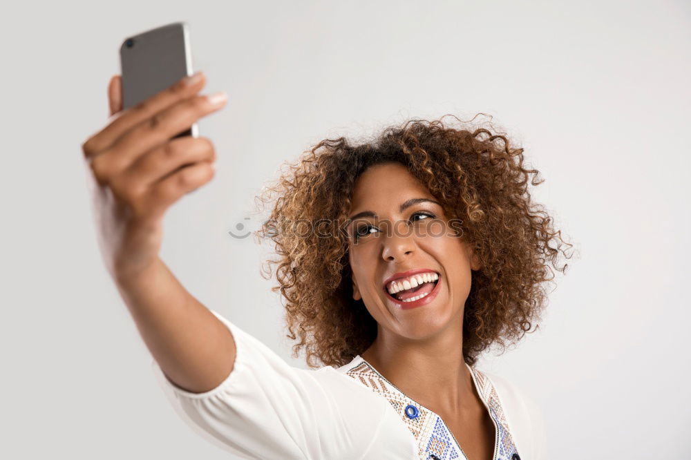 Image, Stock Photo Young casual woman using her smartphone