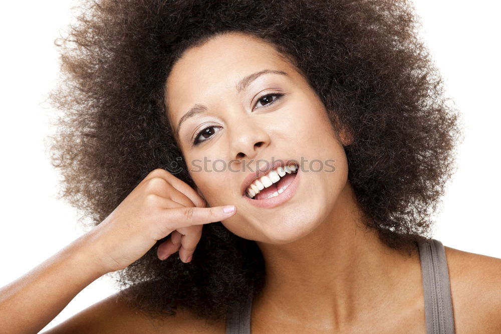 Similar – Portrait of a young black woman smiling with braces