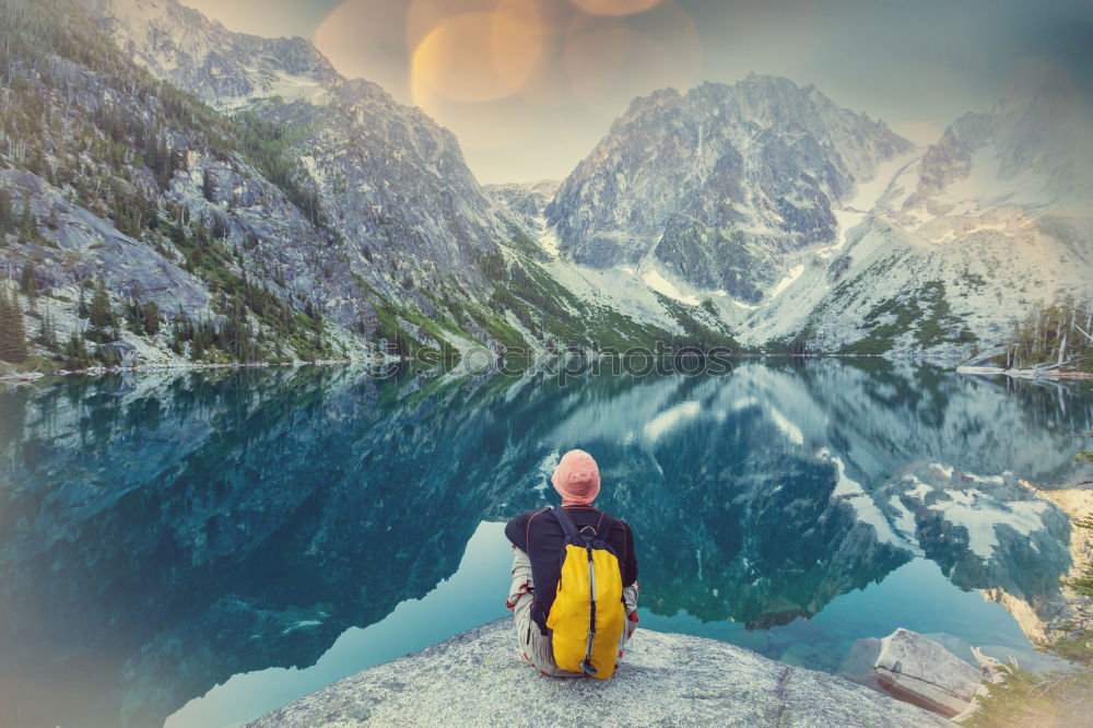 Similar – Image, Stock Photo Backpacker resting.