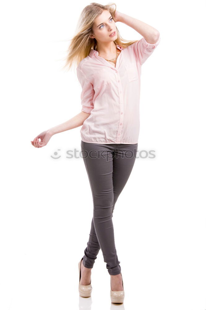 Similar – Image, Stock Photo young redhead woman with curls and freckles stands barefoot in hot pants in front of white door and smiles
