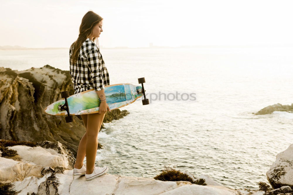 Similar – Group of girls holding surfboard on beach