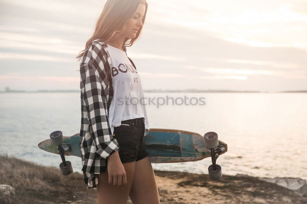 Similar – Image, Stock Photo Happy young adult hipster girl on skateboard with puppy