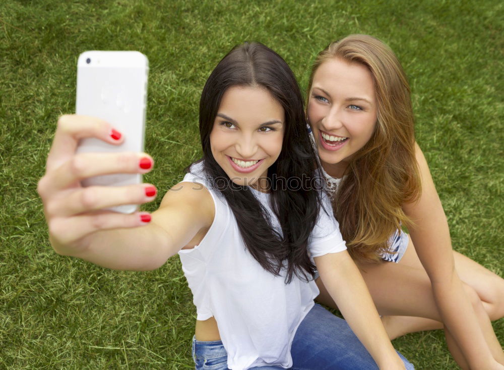 Similar – happy mother and daughter making selfie outdoor in summer