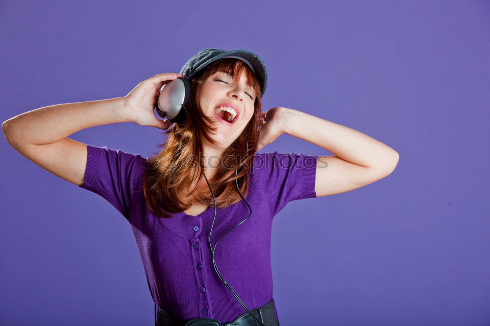 Similar – Angry young woman holding a retro clock