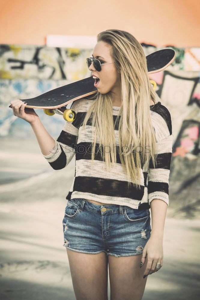 Similar – Woman with tongue out looking at camera