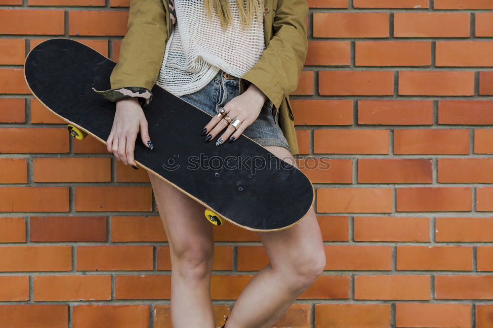 Similar – Cool skateboard woman at a public graffiti park