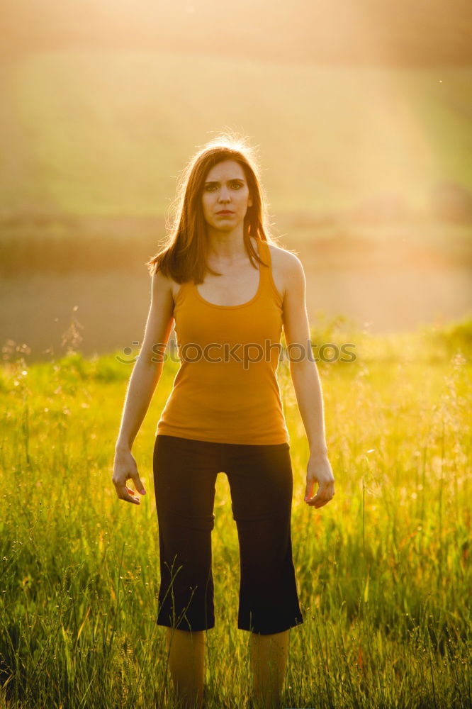 Similar – Attractive woman out exercising in glowing light