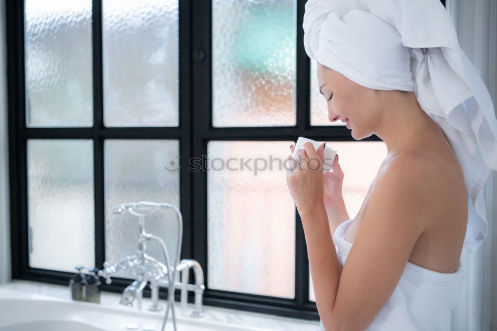 Similar – Woman using a peeling glove in a shower