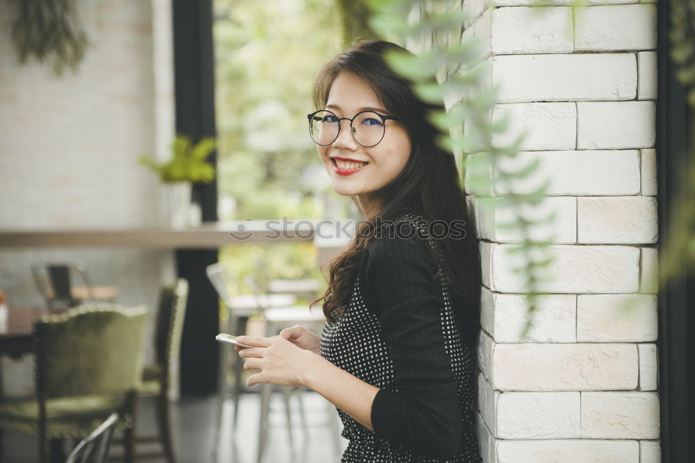 Similar – Beauty girl with glasses with little lights in her hands