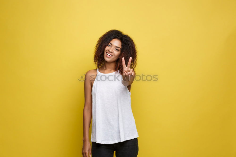 Similar – Woman on Yellow Wall