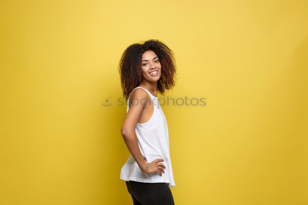 Similar – Woman on Yellow Wall