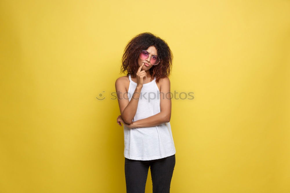 Similar – Woman on Yellow Wall