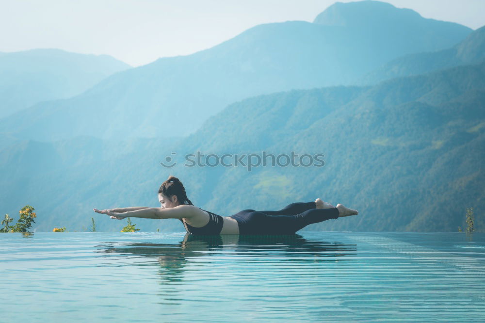 Similar – Man meditating on poolside