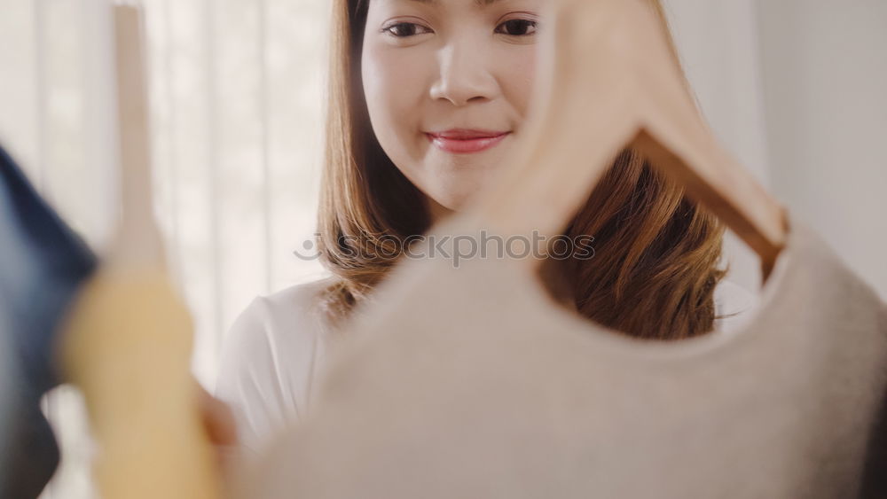 Similar – Image, Stock Photo Young florist packs a wreath of flowers