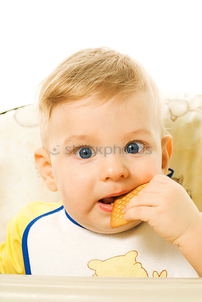 Similar – Image, Stock Photo A cute little girl in chef’s hat sitting on the kitchen floor soiled with flour, playing with food, making a mess and having fun