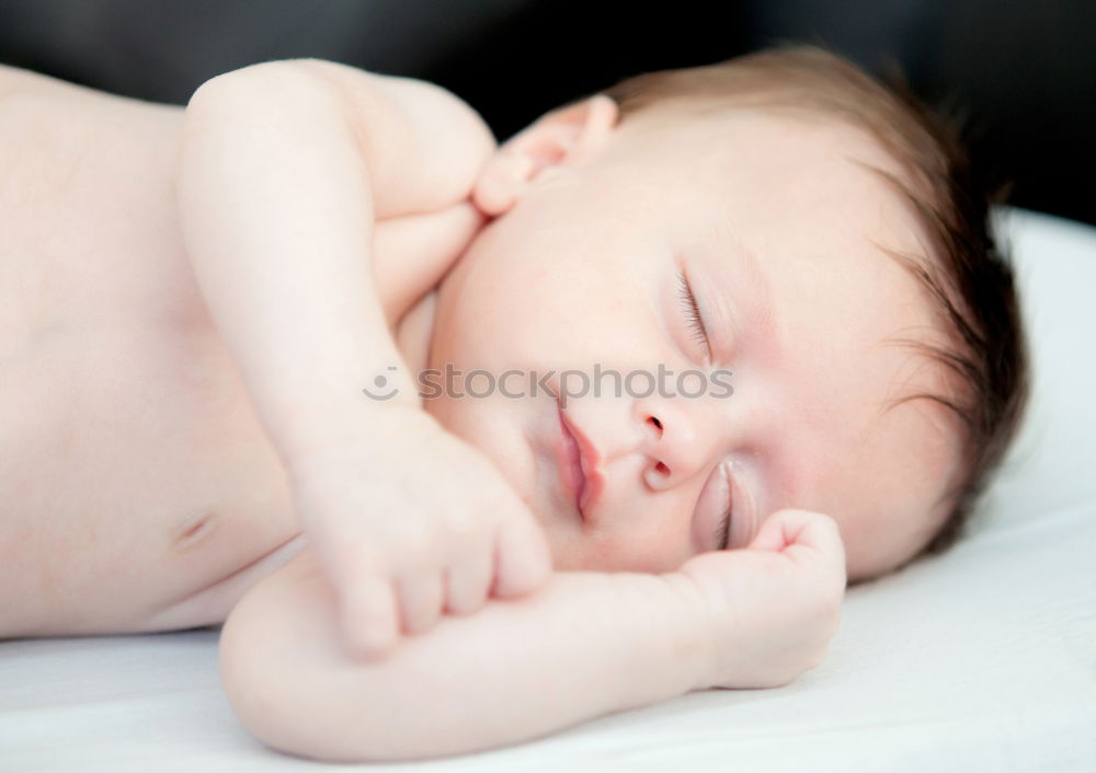 Similar – Portrait of a newborn baby sleeping