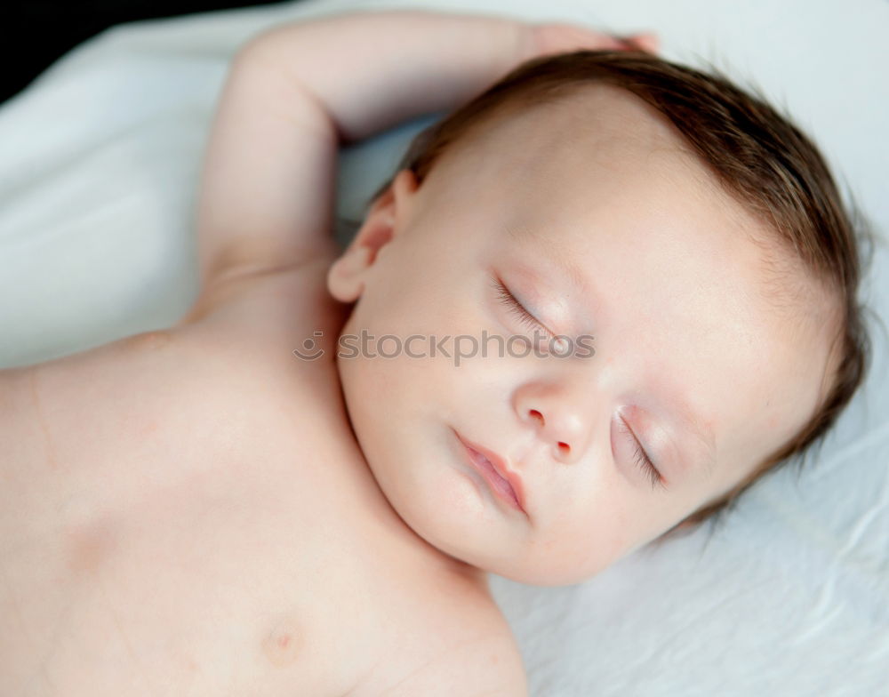 Similar – Portrait of a newborn baby sleeping