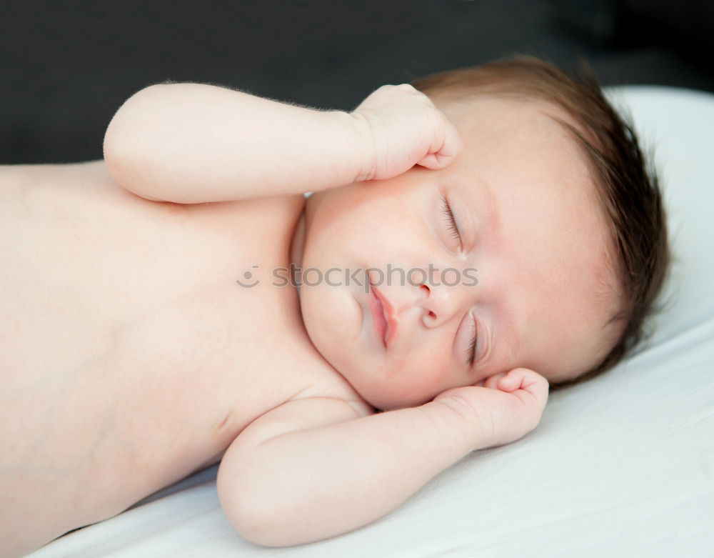 Similar – Portrait of a newborn baby sleeping