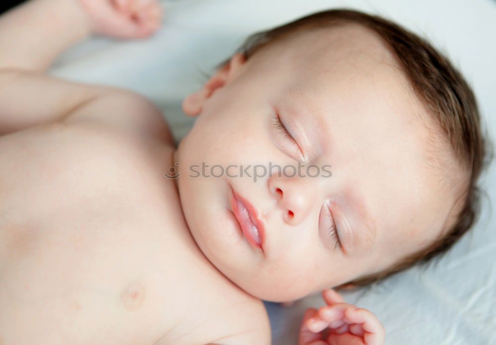 Similar – Portrait of a newborn baby sleeping