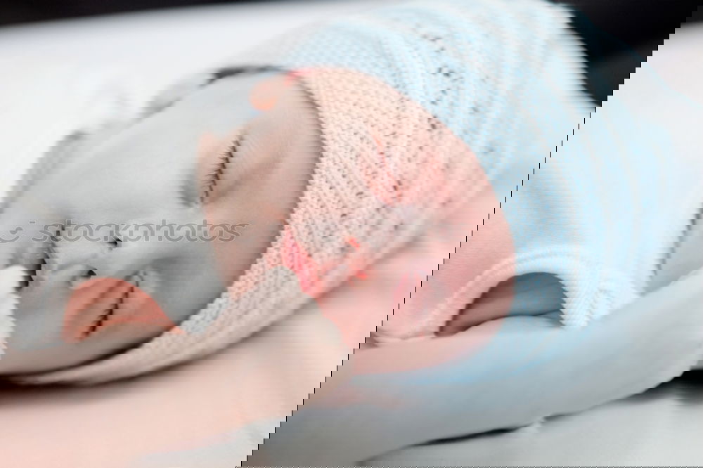 Image, Stock Photo Newborn baby girl sleeping on blue sheets at home