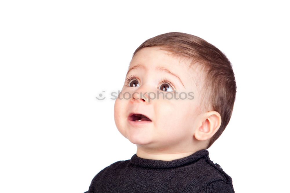 Similar – Boy straightens his tie and looks in the air