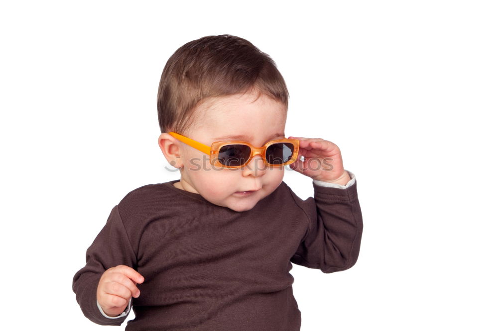 Similar – boy smiling and looking up with carboard glasses