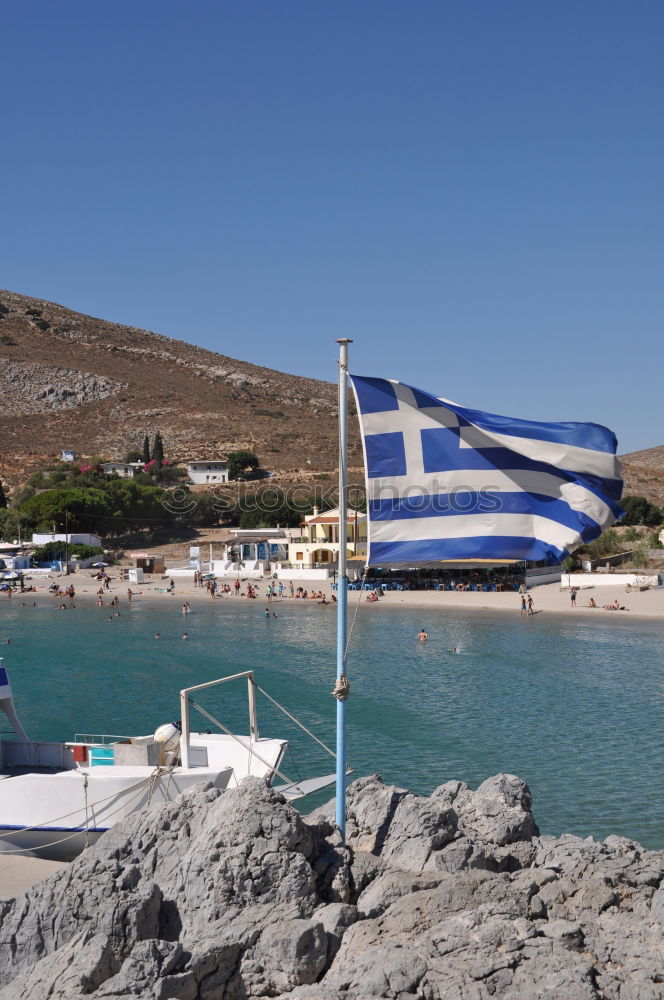 Similar – Image, Stock Photo Greek flag on the beach. Beach houses.