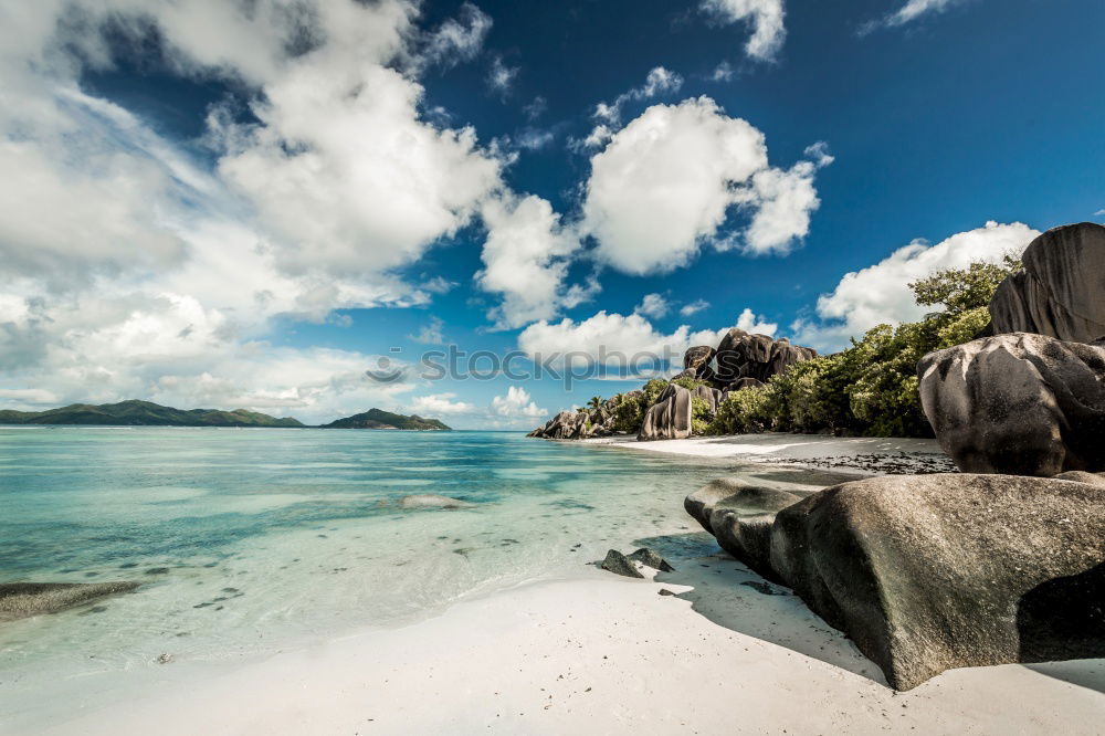 Similar – A view of a isolated beach and blue waters