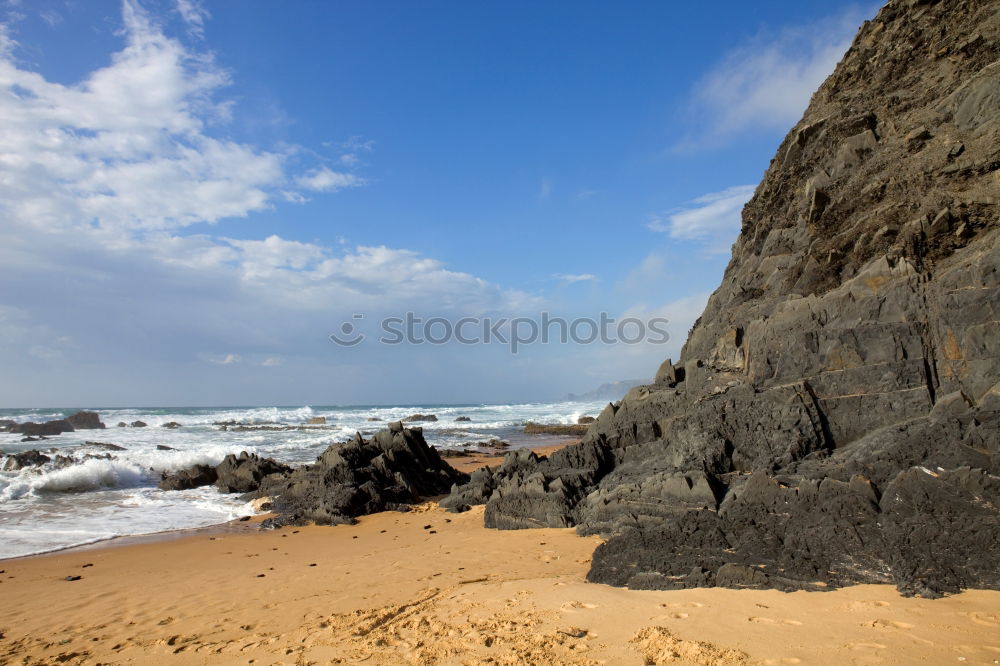 Similar – Lighthouse in Cornwall with rocks in the foreground