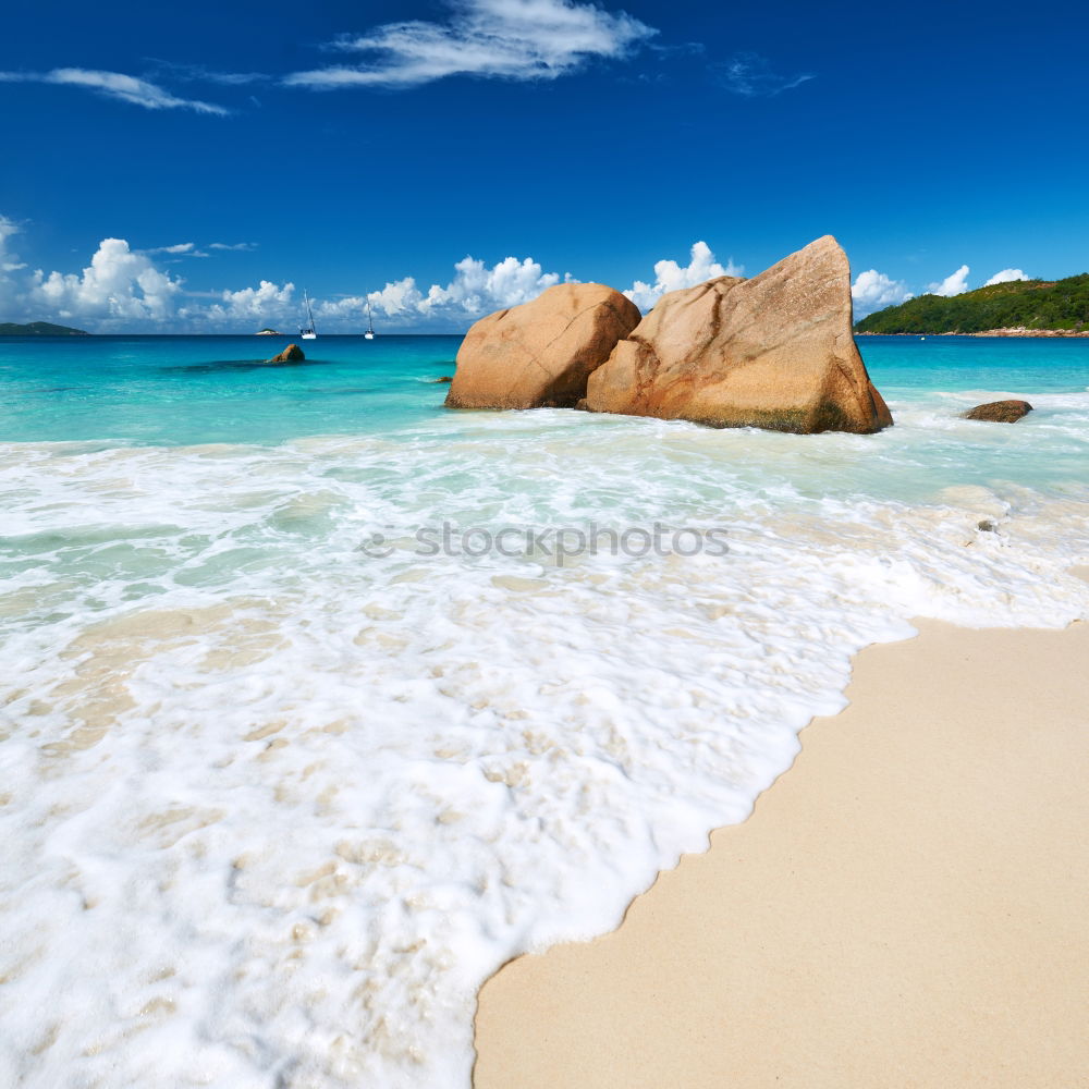 Similar – A view of a isolated beach and blue waters