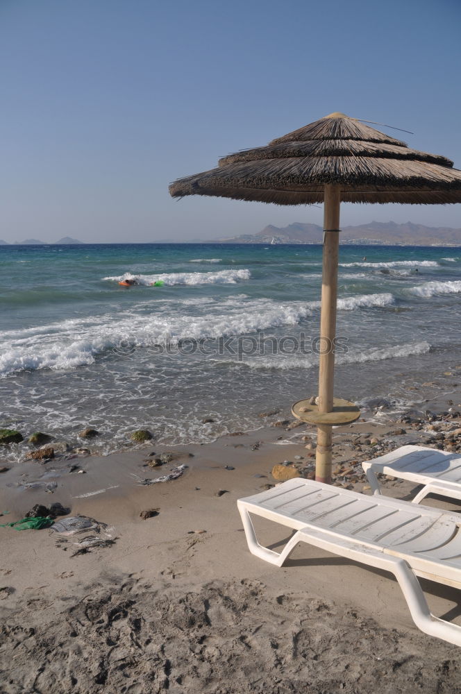 Similar – Empty deckchairs on the beach