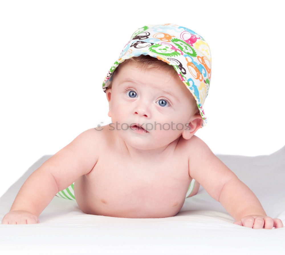 Similar – Little baby girl lying on blanket with colourful polka dots