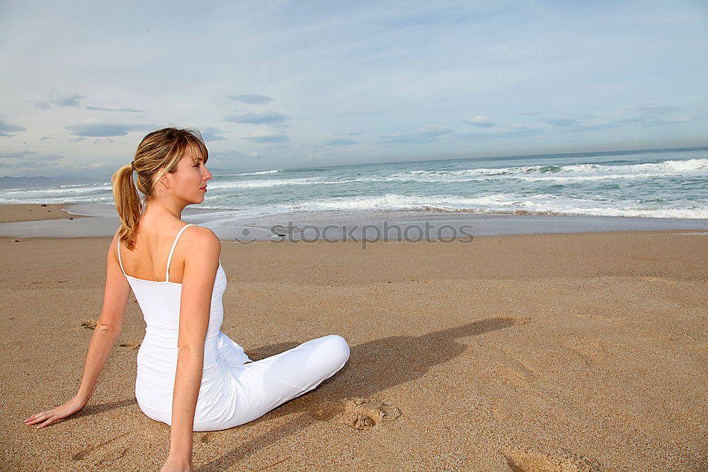 Similar – Image, Stock Photo Caucasian blonde woman practicing yoga in the beach